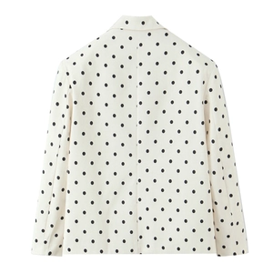 Vue arrière du blazer blanc à pois noirs pour femme avec une coupe ajustée chic