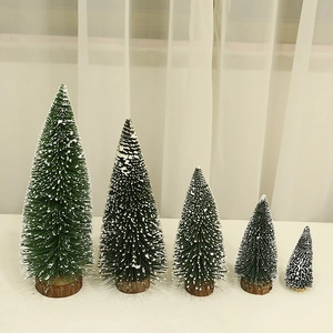 Set of 5 mini artificial snow-flocked Christmas trees with natural wooden bases