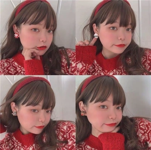 Christmas earrings set with Santa, snowman, and reindeer studs worn by a model