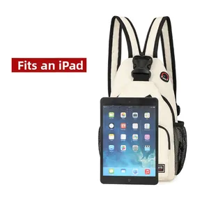Detail view of canvas chest bag showing the mesh water bottle pocket and headphone port