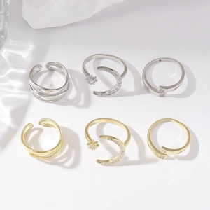 Adjustable gold and silver open rings set with star moon charms and zircon accents