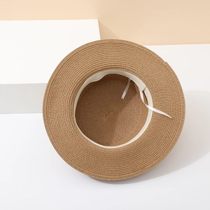 Flat top straw sun hat for women with internal adjustable sweatband and natural fiber texture