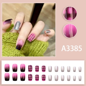 Press-on nails set with black pink gradient, plaid patterns, and silver metallic finish