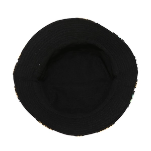 Detail view of cotton bucket hat interior stitching and colorful print brim