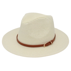 Close-up of woven straw Panama hat with brown leather belt strap and gold buckle detail