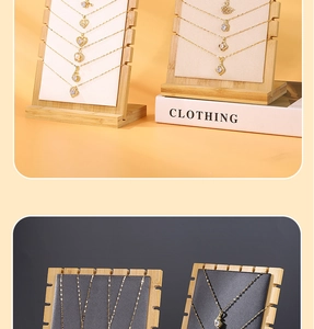 Detailed view of bamboo necklace display stand with premium velvet inlay and golden chains