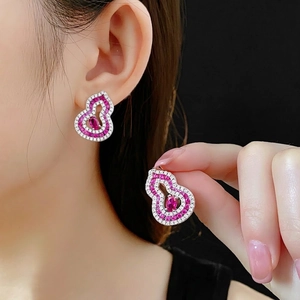 Elegant Wulu drop earrings featuring red and white zircon pavé in a silver setting