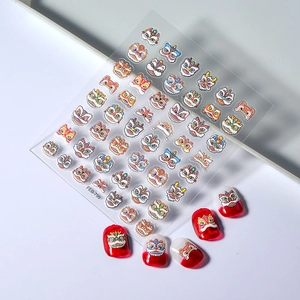 Detailed macro view of 5D embossed Chinese lion nail art decals and red sample nails