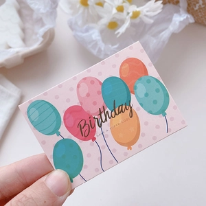 Minimalist pink polka dot birthday card with colorful balloons and gold text