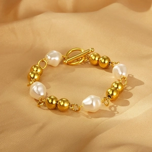 Elegant 18k gold plated bead and baroque pearl bracelet with vintage OT toggle clasp