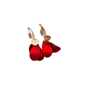 Elegant retro earrings with deep red petals and sparkling zircon on golden metal hooks