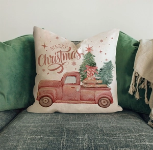 Detailed Christmas pillowcase featuring vintage red truck and tree on sofa