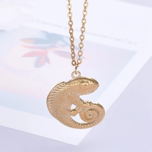 Detailed close-up showing the 18k gold plated lizard pendant with scale texture and spiral tail