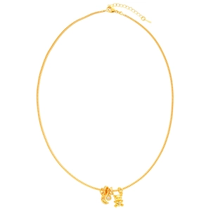 Minimalist gold necklace featuring moon and bear pendants with cubic zirconia accents