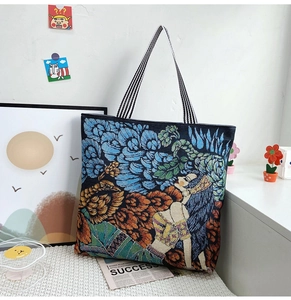 Detailed texture of artistic floral woven tote bag with retro figure pattern and striped strap