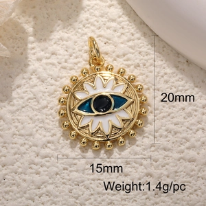 Detail showing 15x20mm gold evil eye pendant dimensions and blue enamel craft