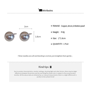 Detailed spec sheet of grey pearl earrings with zircon row and silver needle details
