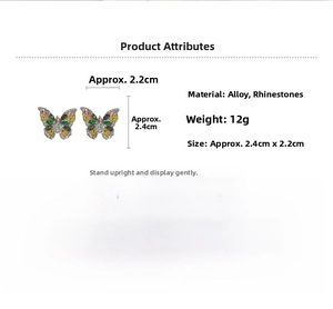 Detailed view of butterfly stud earrings with colorful rhinestones and silver needles