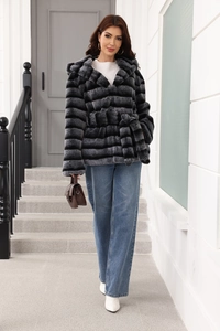 Detail of grey striped faux fur hooded coat with belted waist and premium texture