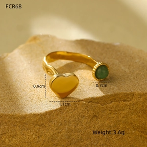 Golden double-layer adjustable ring with green zircon and heart detail on rock