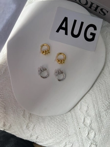 Detailed view of S925 sterling silver hoop earrings with unique spiral textured finish