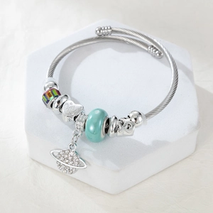 Silver cable heart charm bracelet with Be my Valentine heart and planet pendant