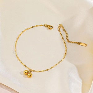 Elegant gold plated stainless steel bead bracelet with adjustable chain on silk