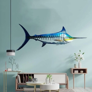 Detailed blue and silver metal marlin fish skeleton wall art sculpture in modern living room