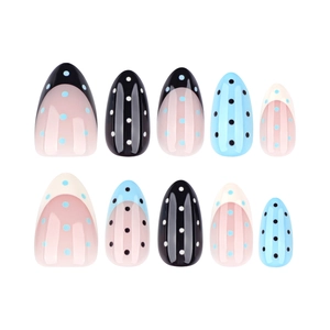 French almond press-on nails set with blue and black polka dots and glossy finish