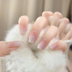 Square gradient pink purple press-on nails with fine glitter on soft plush background