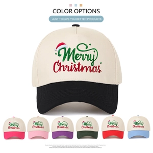 Detail showing embroidered Merry Christmas text and colorful brim options for baseball caps