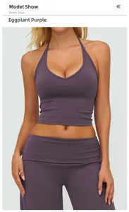 Detail shot of the eggplant purple halter yoga top and high-waisted leggings set