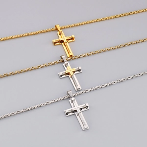 Detailed view of gold and silver stainless steel cross pendants with box chains in three colors