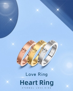 Close-up of three-color heart rings with embedded crystals in rose gold, gold and silver