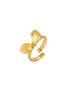 Detailed view of an 18k gold plated stainless steel bow ring with adjustable open band