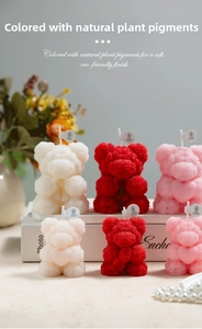 Macro detail of rose textured bear candles with elegant bow and decorative label