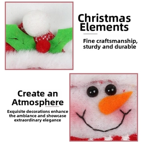 Detail of Christmas cutlery holder with knitted texture and snowman embroidery patterns