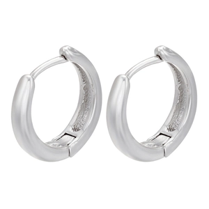 Macro detail of silver geometric rectangle huggie earrings with S925 engraved hallmark