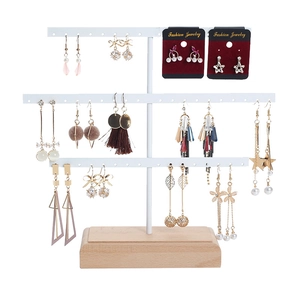 Three-tier jewelry stand with wooden base for earrings and studs display
