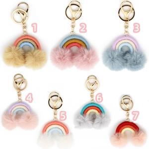 Handmade boho rainbow keychain set with colorful cotton weave and soft plush pom-poms