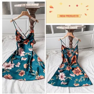 Floral satin backless slip dress in dark green with spaghetti straps and V-neckline