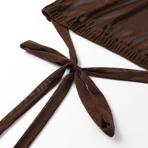 Close-up of dark brown shimmering mesh fabric with drawstring details and gathered edges