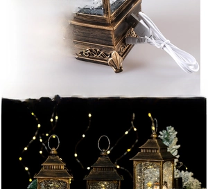 Lanterne boule à neige de Noël avec câble USB et finition bronze vintage détaillée
