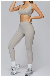 Close-up of heather grey brushed yoga set featuring racerback bra and high-waist leggings