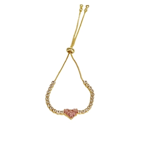 Adjustable gold-plated Bolo bracelet featuring a pink heart zircon and side accents