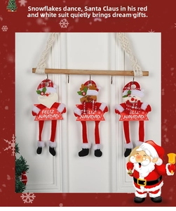 Three Christmas hanging dolls with Santa Reindeer and Snowman on a wooden bar