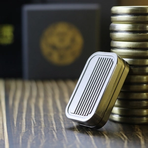Detailed view of silver striped metal storage box for decompression fidget slider toy