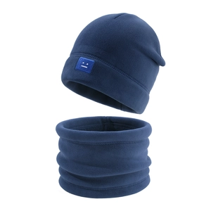 Detailed view of fleece thermal winter set with hat, neck warmer and iconic patch