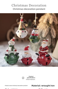 Detail of Nordic painted iron Christmas bells featuring Santa, snowman and elk designs