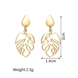 Detail showing 3cm length and 1.4cm width of gold monstera leaf stainless steel stud earrings